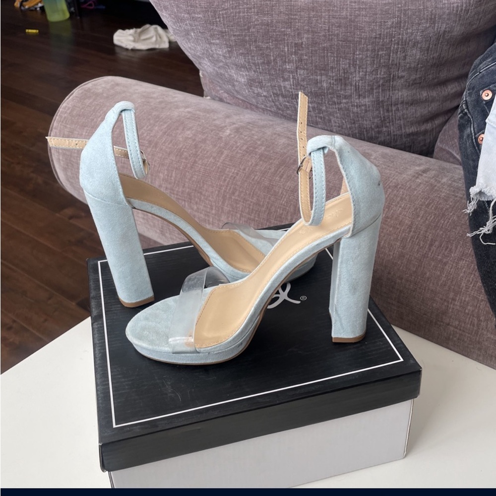 Baby blue heels, Tall, thick and wide heel. Size 6.
